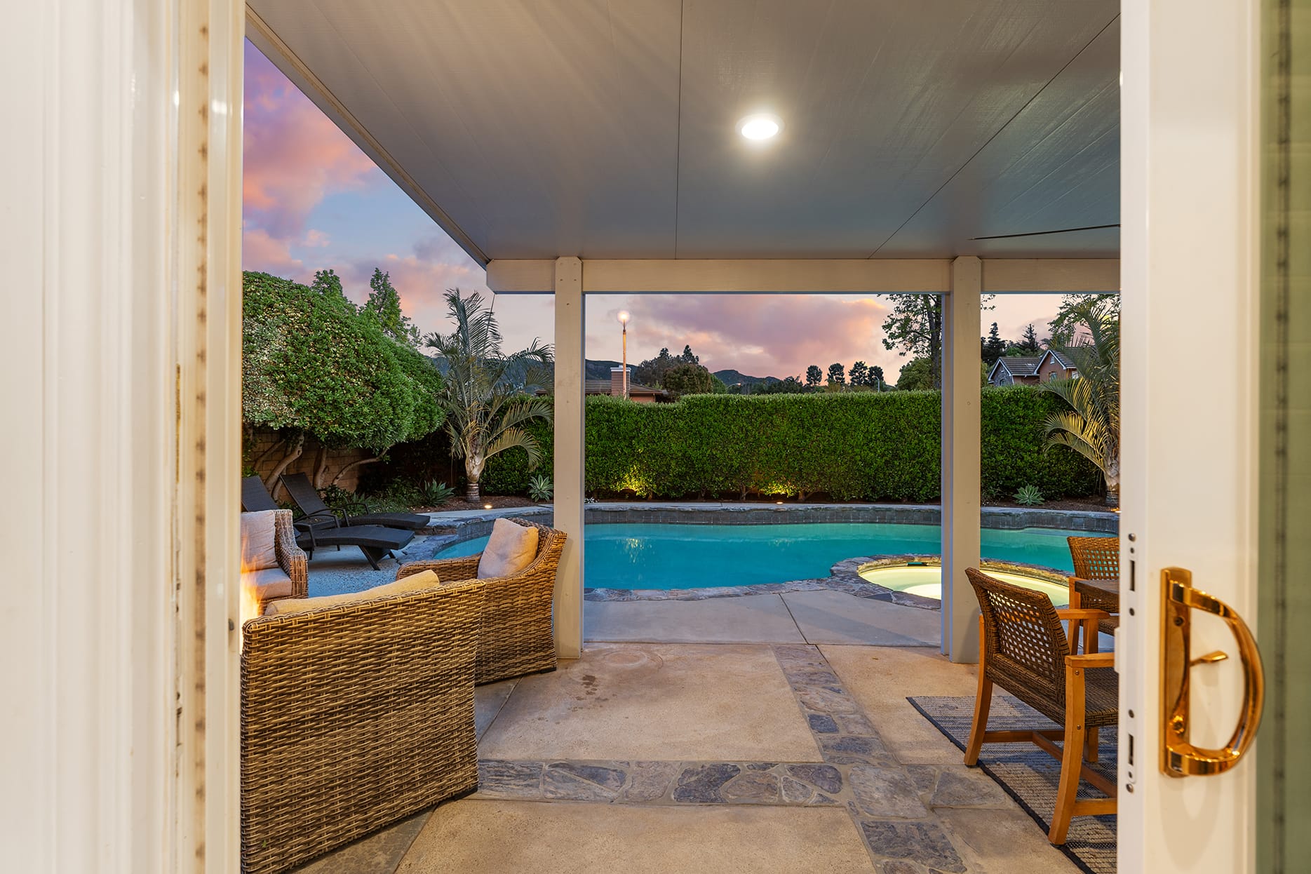 Covered patio with SONOS sound system for entertaining