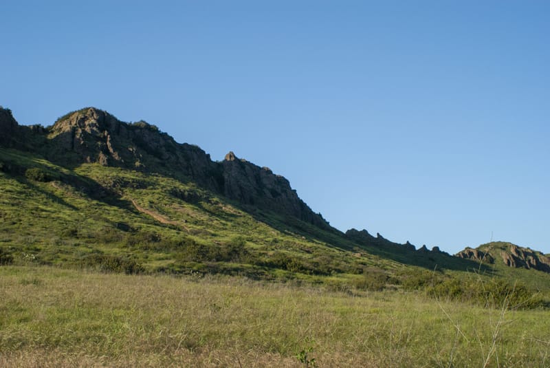 Green rocky ridgeline and grassy meadow at Wildwood Park in Thousand Oaks