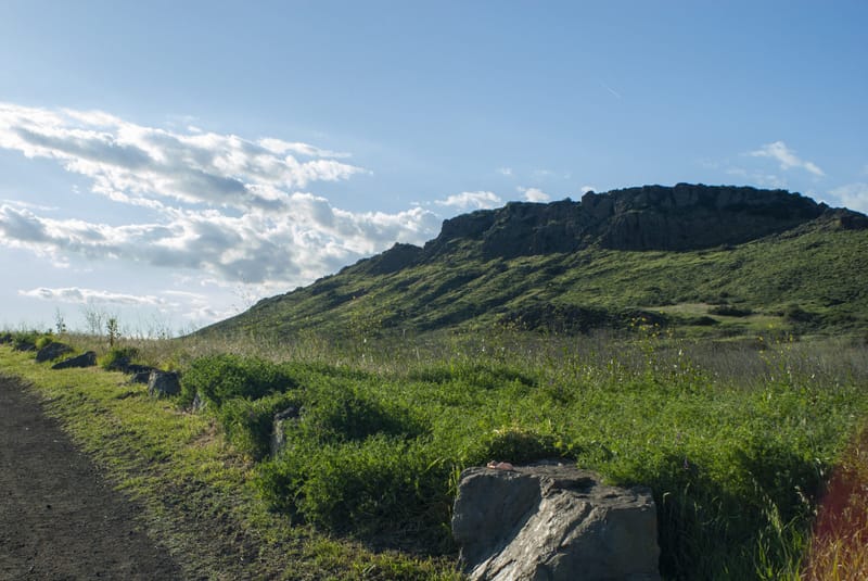 Green hillside and rocky ridge along a trail in Wildwood Park, Thousand Oaks
